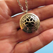 AROMATHERAPY NECKLACE IN HAND